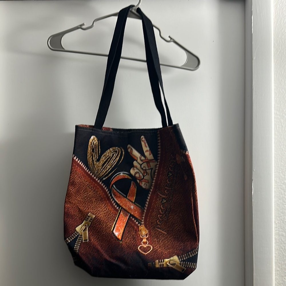 NWOT.  LOVE PEACE CURE MS TOTE